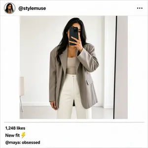 A lifestyle fashion selfie post, straight-on and flat. A stylish woman taking a mirror-fit selfie with her phone covering part of her face, wearing a trendy outfit (oversized jacket), standing in a bright minimal room. At top, the standard Instagram UI chrome: a small circular profile avatar and handle; beneath the image, a like count, a one-line caption "New fit ⚡", and a single short comment. Clean, bright, high-contrast social-media aesthetic, crisp detail, no tilt, no 3D perspective.